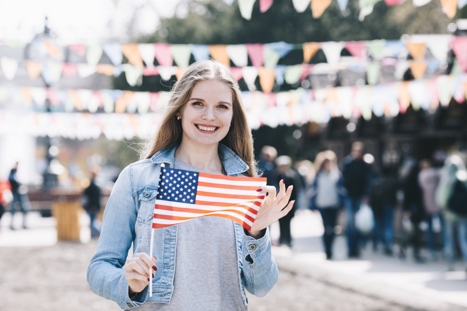 beautiful-woman-with-american-flag-independence-day